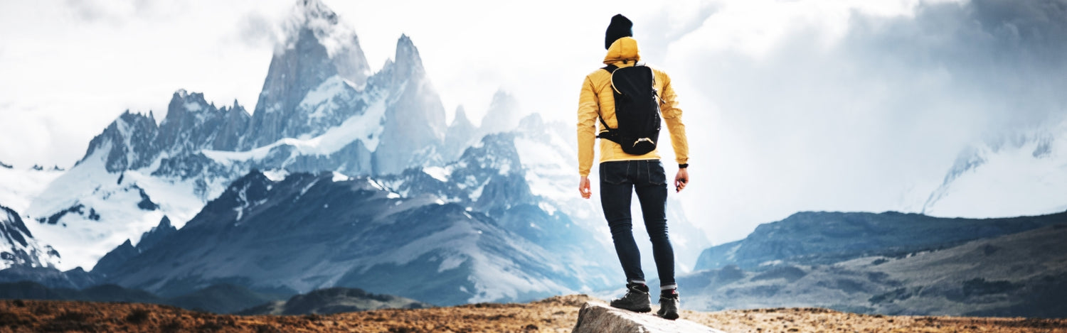 Man hiking through mountains
