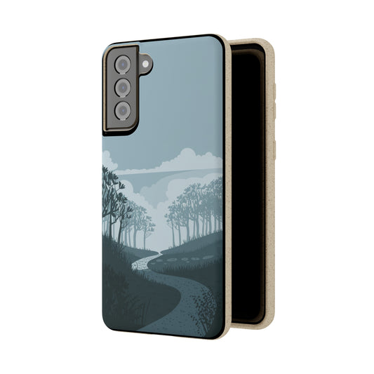 The Wanderlust Biodegradable Phone Case by Printify features a minimalist, nature-inspired design with a winding forest path in blue and gray. This eco-friendly case blends style and sustainability.